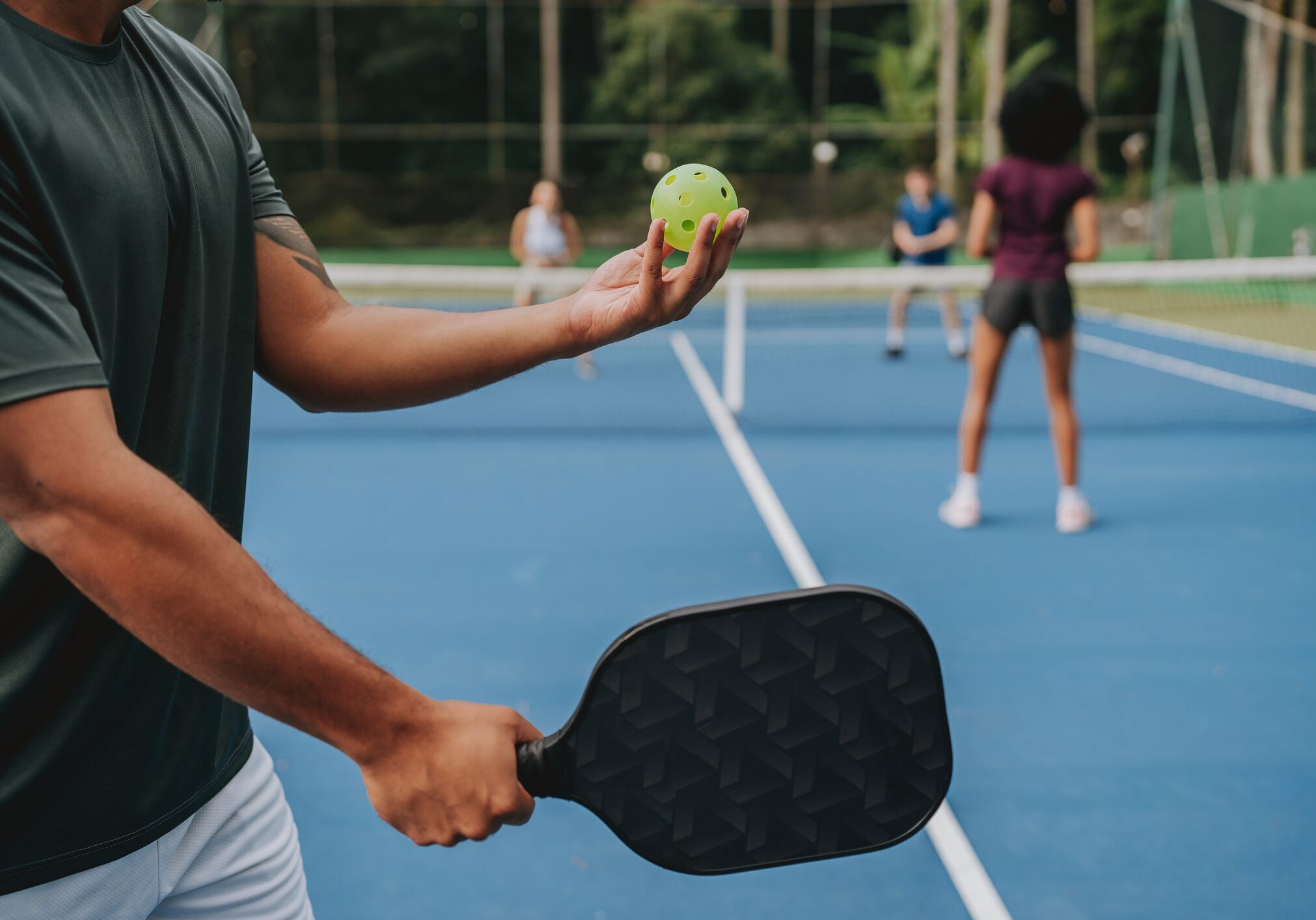 People playing pickleball